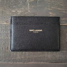 Saint Laurent Grain Leather Card Case Authentic / Brand New With Tags / Purchased From The Ysl Website (Gold Saint Laurent Stamping) Luxury Card Holder With Interior Slots For Everyday Use, Luxury Textured Leather Wallets For Everyday, Luxury Black Card Holder For Everyday Use, Elegant Black Card Holder For Daily Use, Luxury Wallets With Card Slots, Luxury Black Wallet For Everyday Use, Designer Everyday Card Holder With Interior Slots, Designer Card Holder For Everyday Use, Luxury Black Everyday Wallets