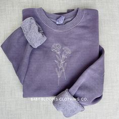 "A small grouping of 2 carnations (January's birth month flower) embroidered on a cozy crewneck sweatshirt in your choice of thread color. The perfect gift for a January birthday, a mom of a January baby, a mom of twins born in January, as a commemoration of a loved one, or just for someone who loves carnations. Design is hand drawn and digitized by me, then stitched in house by embroidery machine.  Further customize by going to my shop section \"sweatshirt add-ons\" and adding something special to the sleeve, such as kids' names, hearts, dates, bible verses, etc! SHIPPING: Processing time is 5-7 business days. Please message me if you have a specific deadline or concern and I will always do my best to work with you! MATERIALS: - Pigment Dyed Crewnecks from Independent Trading Co. which ha Birth Flower Sweatshirt, Lavender Cotton Crew Neck Sweatshirt, Embroidered Lavender Cotton Top, Embroidered Cotton Lavender Top, January Birth Month Flower, Mom Of Twins, January Baby, Flower Sweatshirt, January Birthday