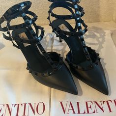 These Gorgeous Valentino Rockstud Caged Black On Black Heels Will Elevate Any Outfit You Wear Them With! Brand New With Box And Dust Covers. Selling Them Because They Are A Little Too Tight On Me And I Missed The Short Return Window. Only Worn In My Non-Smoking House To Try On. Will Post More Photos Later. Designer Heels With Ankle Strap And Studded Outsoles, Designer Spiked Pointed Toe Heels, Designer Spiked Heels With Pointed Toe, Designer Heels With Spikes And Pointed Toe, Formal Studded Open Heel Shoes, Formal Heels With Studs And Open Heel, Formal Studded Open Heel Heels, Formal Open Heel Studded Heels, Designer Spiked Open-toe Heels