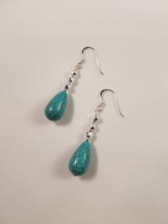 Not only do I love the Turquoise gemstone, I also love the sterling silver faceted beads. - Turquoise Teardrop Beads - Sterling Silver Faceted Round Bead - Sterling Silver Beads - Sterling Silver Hook Earrings Turquoise promotes spiritual attunement and aids communication. Turquoise Teardrop Beaded Earrings, Turquoise Teardrop Earrings With Faceted Beads, Turquoise Teardrop Faceted Beads Jewelry, Turquoise Faceted Drop Earrings, Turquoise Faceted Teardrop Earrings, Turquoise Teardrop Faceted Jewelry, Turquoise Teardrop Faceted Earrings, Faceted Turquoise Teardrop Earrings, Handmade Turquoise Teardrop Earrings With Round Beads