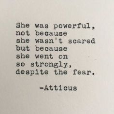 an old typewriter with the words, she was powerful not because she doesn't scared but because she went on so strongly, despite the fear