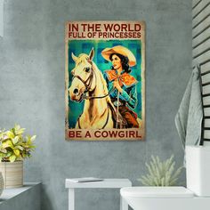 a woman riding a horse in the world full of princesses be a cowgirl poster