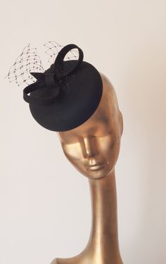 Please note that all items in my shop are made to order New Collection Fall 2016/17 Fascinator Unique Modern Black Felt Fascinator. Decorated with French Veil For parties and outdoors. Mounted with elastic rubber or slim headband Diameter : 16 cm Finished with lining and delicate petersham cotton grosgrain ribbon. If you need any info please contact me :) --------------------------- SHIPPING INFORMATION I will ship your purchased item within 6-9 business days after receiving payment to your addr Formal Hats With Adjustable Round Crown, Formal Adjustable Hat With Round Crown, Elegant Black Beret For Party, Formal Black Mini Hats With Structured Crown, Black Fascinator With Pinched Crown, Black Mini Hat With Short Brim For Church, Black Flat Cap For Party, Adjustable Black Mini Hat For Church, Black Mini Hat With Pinched Crown For Formal Occasions