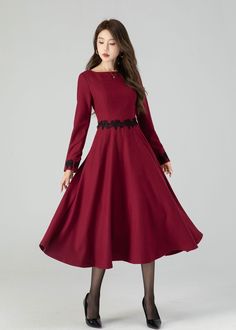 Discover modern elegance in our burgundy long-sleeved wool midi dress, thoughtfully designed with lace details at the waist and cuffs. The burgundy shade effortlessly stands out, and the premium wool fabric ensures both coziness and luxury. The intricate lace elements offer a unique and graceful touch. Whether you're exploring the city or enjoying a cozy evening, this midi dress is a chic and practical option for staying fashion-forward and snug. Details: * 35% wool blend, 35% fiber and polyester, 30% nylon * Polyester lining * Two side pockets * Right zipper dress * Long sleeves dress * Lace dress * Autumn winter dress * Dry clean MODEL SIZE Bust 85 cm(33.4") Waist 67 cm(26.7") Height 168cm (5' 6") She wears size XS CUSTOM MADE SERVICE If you  * Need a tailored clothes with your body meas Fall A-line Dress With Lace Trim, Wool Midi Dress With Long Sleeves For Fall, Wool Long Sleeve Midi Dress For Fall, Fall Long Sleeve Wool Midi Dress, Fall Wool Midi Dress With Long Sleeves, Formal Wool Dress For Winter, Formal Winter Wool Dress, Long Sleeve Wool Dresses For Fall, Elegant Winter Dresses With Lace Trim