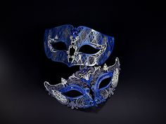 Designed to mesmerize, this extraordinary Blue mask is adorned with stunning blue sapphire rhinestones, making it an absolute show-stopper! Embellished with glitter for an added touch of glamour, making you and your partner stand out among the crowd. Be the center of attention at masquerade balls, proms, Halloween parties, or any event that demands a touch of elegance and mystery. Age Group/Gender - Adult/Unisex Size/Type - One size fits all adults Mask Color - Navy Glitter Color - Silver and na Elegant Blue Masquerade Mask For Parties, Elegant Blue Eye Mask For Masquerade, Blue Venetian Masquerade Mask For Party, Blue Eye Mask For Carnival, Blue Masquerade Mask For Mardi Gras, Elegant Blue Mask For Masquerade, Blue Venetian Masks For Masquerade, Blue Mardi Gras Masquerade Mask, Blue Venetian Eye Mask