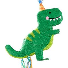 a green dinosaur balloon with a party hat on