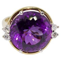 Eye-catching ladies' luxury ring, 14k gold with large faceted amethyst and diamonds. Including certificate of authenticity. US ring size 8. On request we can adjust the ring size expertly. Goddess Crystals, Ladies Gold Rings, Large Diamond Rings, Kunzite Ring, Amethyst Cocktail Ring, Luxury Ring, Amethyst Set, Tanzanite Diamond Ring, Yellow Diamond Rings