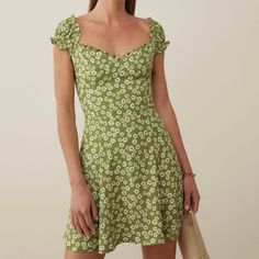 Nwot!!!! Reformation Pacey Minidress In Fennel Sz: 2 This Is A Lightweight Drapey Crepe Fabric With A Dry Hand Feel - 53% Viscose, 47% Rayon. Dry Clean Only Green Sundress, French Floral, Reformation Dress, Reformation Dresses, Vacation Dresses, Floral Ruffle, Crepe Fabric, Fennel, Floral Mini Dress