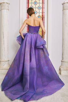 Description Purple Ballgown, Long dress Sleeveless Open neckline Strapless Tulle, Printed fabric, Crystal beading Dry Clean Made in Lebanon Design 19 Organza Ball Gown With Sweetheart Neckline For Gala, Organza Ball Gown For Gala, Fitted Ruched Bodice Organza Evening Dress, Organza Strapless Ball Gown With Fitted Bodice, Strapless Organza Evening Dress With Ruched Bodice, Strapless Organza Ball Gown With Fitted Bodice, Organza Gown With Sweetheart Neckline For Evening, Prom Gown With Pleated Tulle Bodice, Prom Tulle Gown With Pleated Bodice