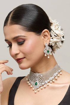 Silver plated floral jaali patterned choker necklace embellished by white stone, green emerald detail and pearl drops. Comes with matching earrings. - Aza Fashions Elegant Pearl Necklace With Tilla, Elegant Kundan Choker Necklace With Tilla, White Choker Necklace For Reception, Elegant Kundan Choker With Intricate Design, Elegant Kundan Choker Necklace With Intricate Design, Elegant Tilla Jewelry For Reception, Elegant Green Bridal Choker Necklace, Elegant White Choker With Stone Work, White Elegant Choker With Stone Work