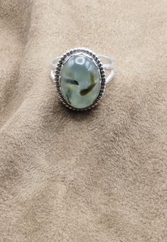 Unique Prehnite Ring US Size 10.   Can be sized for no additional charge. Top: 20mm x 17mm; 3/4" x 5/8" Weight 7.7 Grams Sterling Silver 925, Handmade $70 Exclusively Designed by Richard James for Richlo Jewelry Check out our other fine jewelry at: https://www.etsy.com/shop/arizonagemstudio Prehnite is considered a "stone of dreaming"; it is believed to increase the power of the dream state, strengthen lucid dreaming and promote communication with other planes of existence. It is also considered a "stone of prophecy," with long use by indigenous peoples of South Africa. Planes Of Existence, Prehnite Ring, Richard James, Green Valley, Us Size 10, Lucid Dreaming, Ring Sterling Silver, Ring Handmade, The Dream