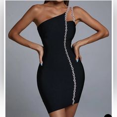 One Shoulder Chain Mini Bandage Dress Featuring Cut Sparkling Diamante Chains Luxury Elegant Bandage Dress For Formal Occasions, Luxury Evening Dress With Back Zipper For Night Out, Formal Bandage Dresses, Chic Luxury Bandage Dress For Formal Occasions, Luxury Chic Bandage Dress For Formal Occasions, Luxury Women's Bandage Dress For Formal Occasions, Stella Dress, Bandage Dress Black, Soiree Dress