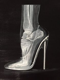 a black and white drawing of a woman's shoe with the heel up to her ankles