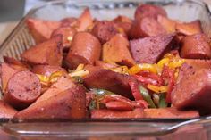 a glass casserole dish filled with potatoes and peppers