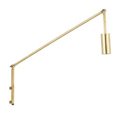 a gold colored wall light with a long arm