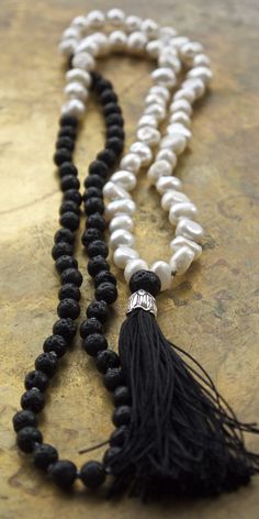 Modern, minimal mala beads with black lava rock and freshwater pearls from Pillow Book Designs // Gorgeous boho chic design. Necklaces Black, White Tassel, Volcanic Rock, Hippie Necklace, Lava Rock, Lava Stone