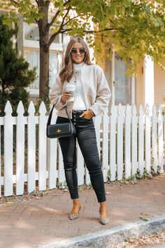 Be effortlessly stylish with this Bomber Jacket in Beige! The long sleeves and elastic back hem provide a comfortable fit, while the gold button detail adds a touch of elegance. With a snap button closure and side pockets, this jacket is as functional as it is fashionable. Lined for added warmth. Layer it over a basic tank top or bodysuit and then pair with jeans, ankle booties, and a matching crossbody bag for an elevated boho chic look! Versatile Business Casual Outerwear For Fall, Chic Fall Outerwear With Button Cuffs, Chic Long Sleeve Outerwear For Everyday, Chic Long Sleeve Outerwear With Zipper Closure, Chic Long Sleeve Everyday Outerwear, Fall Workwear Cardigan With Zipper Closure, Chic Outerwear With Button Cuffs For Day Out, Casual Blazer With Zipper Closure For Work, Chic Fall Blazer With Zipper Closure