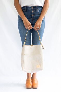 Birch White Leather Carryall & Crossbody – Meanwhile Back on the Farm Rooster Logo, White Leather Bag, Horse Hair Tassels, Wax Canvas, Waxed Canvas Bag, Raw Leather, Small Leather Bag, White Birch, Hobo Style