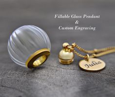 Fillable Glass Pendant - Personalized Gift with Engraving This elegant glass pendant is the perfect keepsake to cherish special moments forever. Fill the pendant with meaningful mementos such as pet hair, baby hair, sand, seawater, flowers, or photos - anything that reminds you of special people, places, or events. Thanks to its thoughtful design, the pendant can be easily filled without the need for glue. The cap screws on and off effortlessly, allowing you to securely store your precious memor Clear Glass Keepsake Necklaces, Clear Glass Necklaces For Keepsake, Clear Glass Keepsake Necklace, Glass Keepsake Jewelry In Clear, Clear Glass Keepsake Jewelry, Gift Idea For Women, Remembrance Jewelry, Special Gifts For Her, Memory Locket