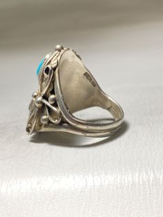 "Turquoise ring coral Navajo southwest sterling silver women men Size 11.50 Weight 11g Length. 1. 1/4 \" Thinnest part of band. 3/16\" Free Shipping & Free Postal Insurance Delivered in a Gift Box If you do not want the ring polished and want to leave the natural patina please let me know at the time of purchase as I do polish rings before I ship rings out. Thanks USPS Domestic Shipping is free for buyers. If a buyer prefers to upgrade to priority, the buyer will pay that portion of the ship Western Silver Turquoise Ring Stamped 925, Southwestern Sterling Silver Opal Ring, Antique Untreated Turquoise Ring In Silver, Antique Style Silver Turquoise Ring, Antique Style Untreated Silver Turquoise Ring, Southwestern Silver Turquoise Ring With Concho, Collectible Southwestern Style Silver Turquoise Ring, Vintage Blue Concho Ring, Southwestern Style Turquoise Ring Stamped 925