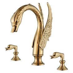 a golden faucet with two handles and an animal head