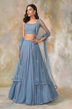 Blue, Grey lehenga with embellished detail. Comes with embellished blouse and dupatta.
Components: 3
Fabric: Georgette, Net
Neckline: Square
Sleeve Length: Sleeveless
Color: Blue, Grey
Embellished
Cutdana, sequins work
Sheer dupatta - Aza Fashions Pooja Peshoria, Crop Top And Skirt Indian, Embellished Lehenga, Grey Lehenga, Sheer Dupatta, Simple Lehenga, Indian Outfits Lehenga, Wedding Lehenga Designs, Lehenga Designs Simple