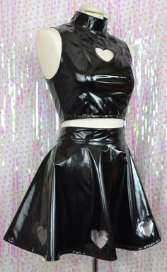 Goth princess perfection! This crop top and skater skirt set is made from glossy black pvc with transparent holo glitter heart cut out details!! Just soooo good! <3 The top zips open all the way up the back and the skirt also has a small zip in the back to get into it. Sizing is as follows: TOP XS - UK 8 - bust 33", bottom of ribs 27" S - UK 10 - bust 34", bottom of ribs 29" M - UK 12 - bust 36", bottom of ribs 31" L - UK 14 - bust 38", bottom of ribs 33" XL UK 16 - bust 40", bottom of ribs 35" Pvc Maid Dress, Rave Outfit Aesthetic, Goth Crop Top, Gold Lingerie, Goth Tops, Glitter Crop Top, Bubble Goth, Goth Princess, Heart Cut Out