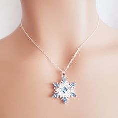 Beautiful Snowflakes Silver Necklace Condition: New Material: Silver Plated Length:18in With 4in Extender Blue Snowflake Sterling Silver Necklace, New Material, Snow Queen, Dream Jewelry, Blue And Silver, Womens Jewelry Necklace, Silver Plate, Silver Plated, Silver Necklace