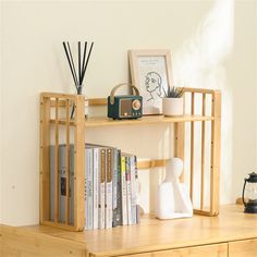 a wooden shelf with books and other items on it