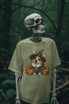 a skeleton wearing a shirt with a corgi dog on it's chest