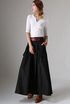 "A wardrobe stable, This long black linen skirt with features two big pockets in the front, Perfected with with gathering and belt loops at the waist , This womens maxi black skirt is make of soft linen fabric, this A line skirt is perfect for pairing with a belt and blouses or basic tees, handmade with love, plus size also available. DETAIL * More color, More size https://etsy.me/2Uyhyqg * 50% linen, 50% cotton, thicker linen * No Lining * Two big pockets * Front zipper and buttons closure * Pl A Line Maxi Skirt, Long Linen Skirt, Black A Line Skirt, Womens Long Skirt, Fall Skirt, Skirt Linen, Skirts Long, Classic Skirts, Maxi Skirt Outfits