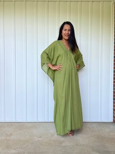 Unwind in absolute comfort with our semi sheer cotton gauze kaftan. This kaftan is perfect for the beach, pool, resort and laid-back time at home. Crafted from quality soft and breathable gauze cotton, it offers an airy fit that's ideal for lounging and cover up. Its relaxed design and easy slip-on style make it your go-to choice for outdoor cover up and relaxed nights at home. Casual Linen V-neck Kaftan, Summer Oversized V-neck Kaftan, Green V-neck Tunic For The Beach, Green V-neck Beach Tunic, Relaxed Fit Linen Maxi Dress For Beach, Green Relaxed Fit Beach Tunic, Oversized Green Summer Tunic, Oversized Green Tunic For Beach, Oversized Green Maxi Dress For Beach