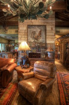 a living room filled with furniture and a chandelier