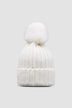 Crafted from Merino wool, this ribbed knit beanie is embellished with a faux fur pom pom. Cold Weather Ribbed Hats, White Double Pom Pom Hat, Cold Weather Hats With Pom Poms, 2 Pom Pom Beanie, Pom Pom Beanies, Beanies For Women, Ribbed Knit Beanie, Beanie With Pom Pom, White Beanie With Fur Pom Pom