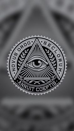 an all seeing symbol with the words annuit coets