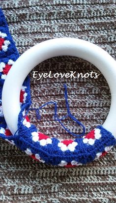 a close up of a crocheted steering wheel cover