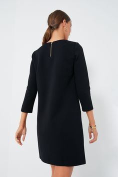 Inspired by the fine craftsmanship of a Parisian atelier, the Black Francoise Mod Mini Dress blends a 60s silhouette with minimalist details. Featuring a shift dress shape, long sleeves, and contrast pockets with buttons, this style is ultra-chic. Pair with gold jewelry for work and heels for date night! Crewneck Three-quarter length sleeves Contrast piping on pockets Gold button details on pockets Shift silhouette Mini length Material: 45% Cotton, 55% Polyester Care: Machine wash cold, tumble d Elegant Mini Dress For Work With 3/4 Sleeves, Modern Work Dress With Back Zipper, Modern Workwear Dress With Back Zipper, Shift Mini Dress With Long Sleeves For Work, Long Sleeve Dresses With French Seams For Work, Long Sleeve Dresses With Back Zipper For Office, Long Sleeve Office Dress With Back Zipper, Midi Dress With Back Zipper For Work In Fall, Fall Midi Dress With Back Zipper For Work