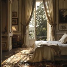 a large bed sitting under a window in a bedroom