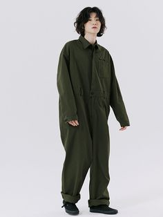 This is a minimal and casual jumpsuit that is made out of high quality cotton 100% fabric. With oversized silhouette suitable for any gender and adjustable belt loops and buttons on the cuffs, it is comfortable to wear in a daily life. - Oversized silhouette- Belt loops on the waist- Adjustable buttons on the cuffs- Natural wood buttons Military Style Cotton Overalls, Utility Cotton Khaki Jumpsuits And Rompers, Utility Style Jumpsuits And Rompers With Relaxed Fit, Oversized Solid Jumpsuits And Rompers With Pockets, Utility Relaxed Fit Jumpsuit In Solid Color, Khaki Cotton Relaxed Fit Jumpsuits And Rompers, Military Style Long Sleeve Cotton Jumpsuits And Rompers, Military Style Long Sleeve Cotton Jumpsuit, Oversized Cotton Jumpsuits And Rompers In Solid Color