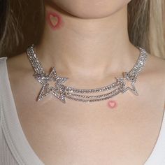 This Y2K aesthetic necklace features sparkling star accents with rhinestones and layered chains for a glamorous, cosmic look Cute Chains For Women, Big Star Necklace, Star Jewelry Aesthetic, Rhinestones Aesthetic, Star Necklace Aesthetic, Sweet Sixteen Jewelry, Jane Magnolia, Camp Fits, Shiny Necklace