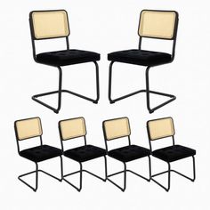 four black and white chairs with mesh backrests on each chair, set of 4