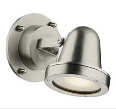 an outdoor wall light that is on the side of a white wall and has a metal dome