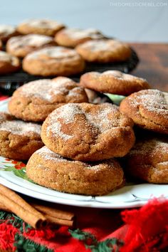 some cookies on a plate and cinnamon sticks