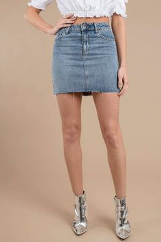 Studded Denim Skirt Edgy Mini Denim Skirt, Edgy Mini Length Denim Skirt, Edgy Cotton Cutoff Mini Skirt, Edgy Cutoff Cotton Mini Skirt, Edgy Denim Mini Bottoms, Edgy Denim Mini Length Bottoms, Edgy Mini Length Denim Bottoms, Edgy Mid-rise Denim Mini Skirt, Trendy Mid-rise Skirt With Frayed Hem