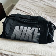 Nike Duffle Bag Nwot Small To Medium Size Duffle Black Nike Duffle Bag Large, Nike Duffle Bag Aesthetic, Everyday Black Nike Bag, Nike Black Everyday Bags, Nike Rectangular Everyday Bags, Nike Black Bags For Everyday, Nike Shoulder Bag For School, Nike Shoulder School Bag, Nike School Bag With Adjustable Strap