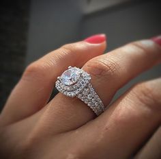 a woman's hand with a diamond ring on it and the caption says, explore