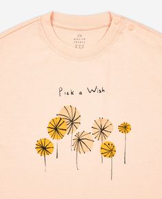 The Pick a Wish boxy t-shirt celebrates a child's playfulness and the magic in their world. The t-shirt is designed for wherever your child wants to go whether it's climbing a tree, running through the forest, or swerving around the corners on their scooter. This t-shirt has relaxed sleeves and oversized, boxy fit for ultimate comfort. The Apricot tee is the perfect pop of colour for the fun days ahead. Pair this with our Rib Knit Leggings - Vanilla for the perfect spring/summer outfit! Boxy Tee, Knit Leggings, Contrast Trim, Spring Summer Outfits, Fabric Care, Rib Knit, Graphic Tshirt, Color Pop, Summer Outfits