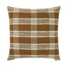 a brown and white plaid pillow on a white background