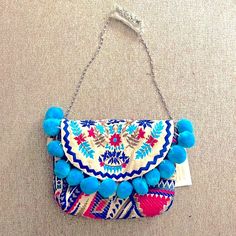 Just The Pop Of Fun And Color You Need To Brighten Your Day! Summer Blue Embroidered Shoulder Bag, Blue Embroidered Summer Shoulder Bag, Blue Embroidered Shoulder Bag For Summer, Casual Blue Embroidered Bag, Blue Embroidered Vacation Bag, Embroidered Blue Beach Bags, Blue Bohemian Bags With Floral Embroidery, Blue Embroidered Beach Bag, Blue Embroidered Bags For Beach