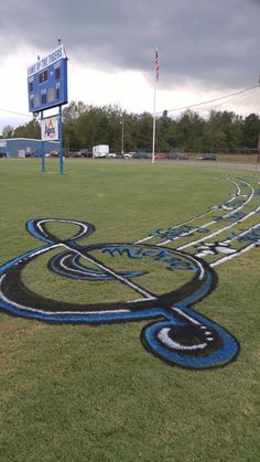 a field with blue and white lines painted on it